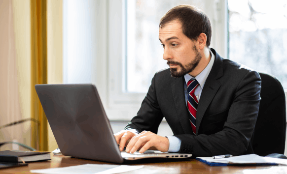 A professional translator providing a quote on a tablet for Translation Services in Bellevue with accuracy.