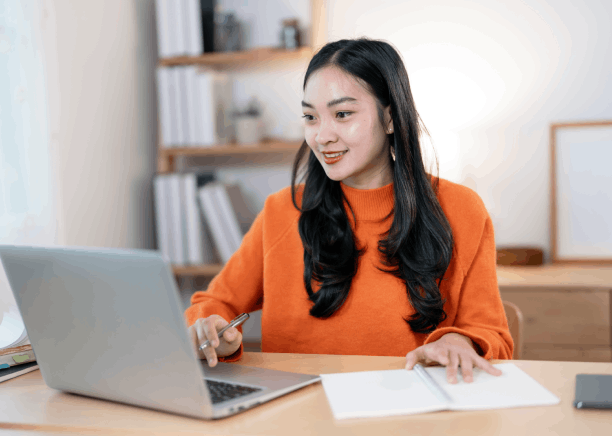 A student checks a translated transcript packet as Translation Services in Bellevue prepare academic documents for admission.