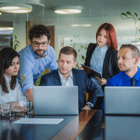 A Washington sales team reviews a Russian contract draft, using Russian Translation Services in Washington for business.