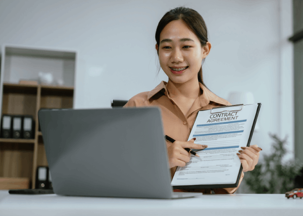 A resident checks a certified USCIS form set for Chinese Translation Services in Washington before submitting the packet.