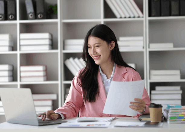 A translator formats a certified immigration file as Translation Services in Kirkland finalize a complete personal document.