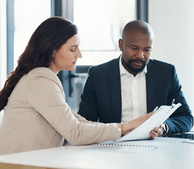 Two reviewers compare the source text to a certified copy, using Translation Services in Seattle for expedited QA checks.
