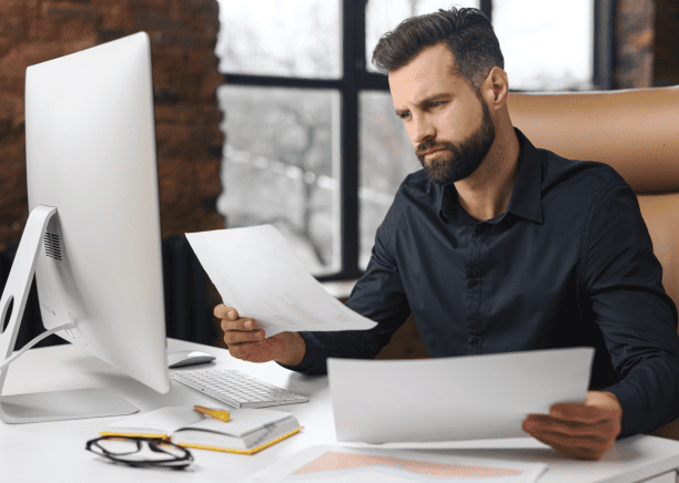 A customer using expert certified translation for personal documents in Washington, DC, ensuring proper formatting.