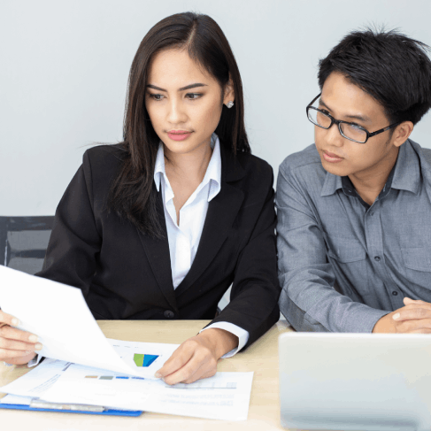 A property manager checks a bilingual lease using Chinese Translation Services in Washington for real estate rentals.