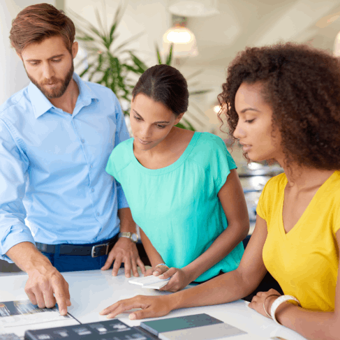 At a closing table, an agent shares translated disclosures as Spanish Translation Services in Washington guide real estate.