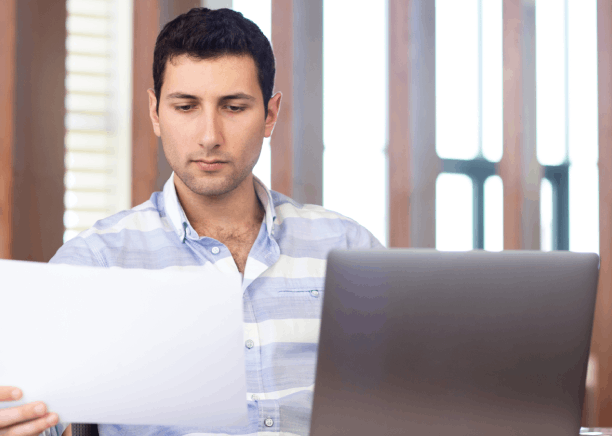 A marketing manager reviews localized brochures as Translation Services in Redmond deliver consistent business messaging.
