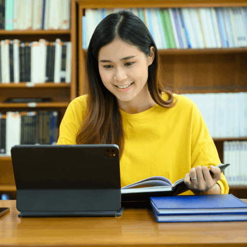 A student reviews a translated university transcript, using Translation Services in Seattle for academic admission paperwork.