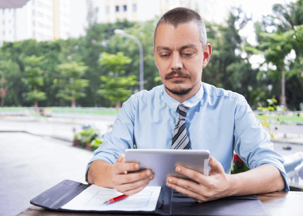 A translator uploads encrypted files to a secure portal, using Translation Services in Seattle for business financial.