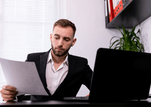 A translator checks diagrams and terms while Spanish Translation Services in Washington translate technical documents.