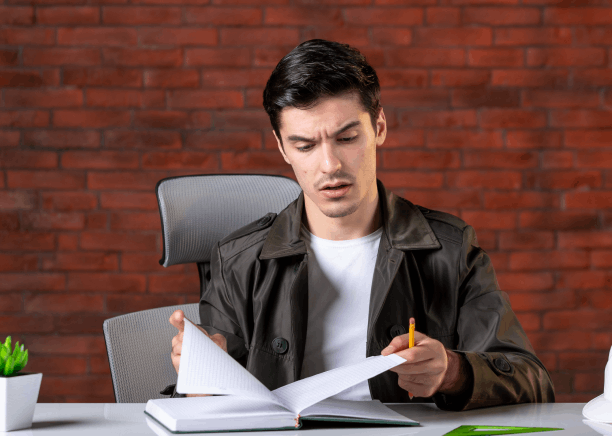 An engineer checks a bilingual manual using Chinese Translation Services in Washington for accurate technical terms.