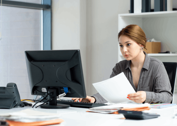 A client checks a USCIS document checklist while using USCIS Vietnamese Translation Services in Washington, D.C.