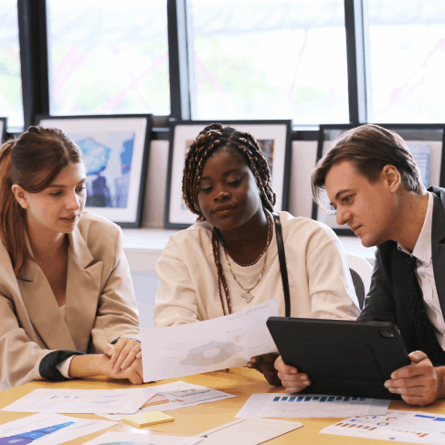 A finance manager checks a bilingual balance sheet as Russian Translation Services in Washington handle financial reports.