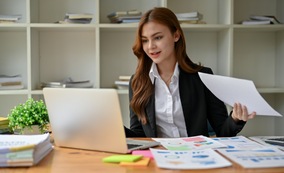 A certified translator works on birth certificate translation services in Washington for USCIS acceptance, ensuring accuracy.